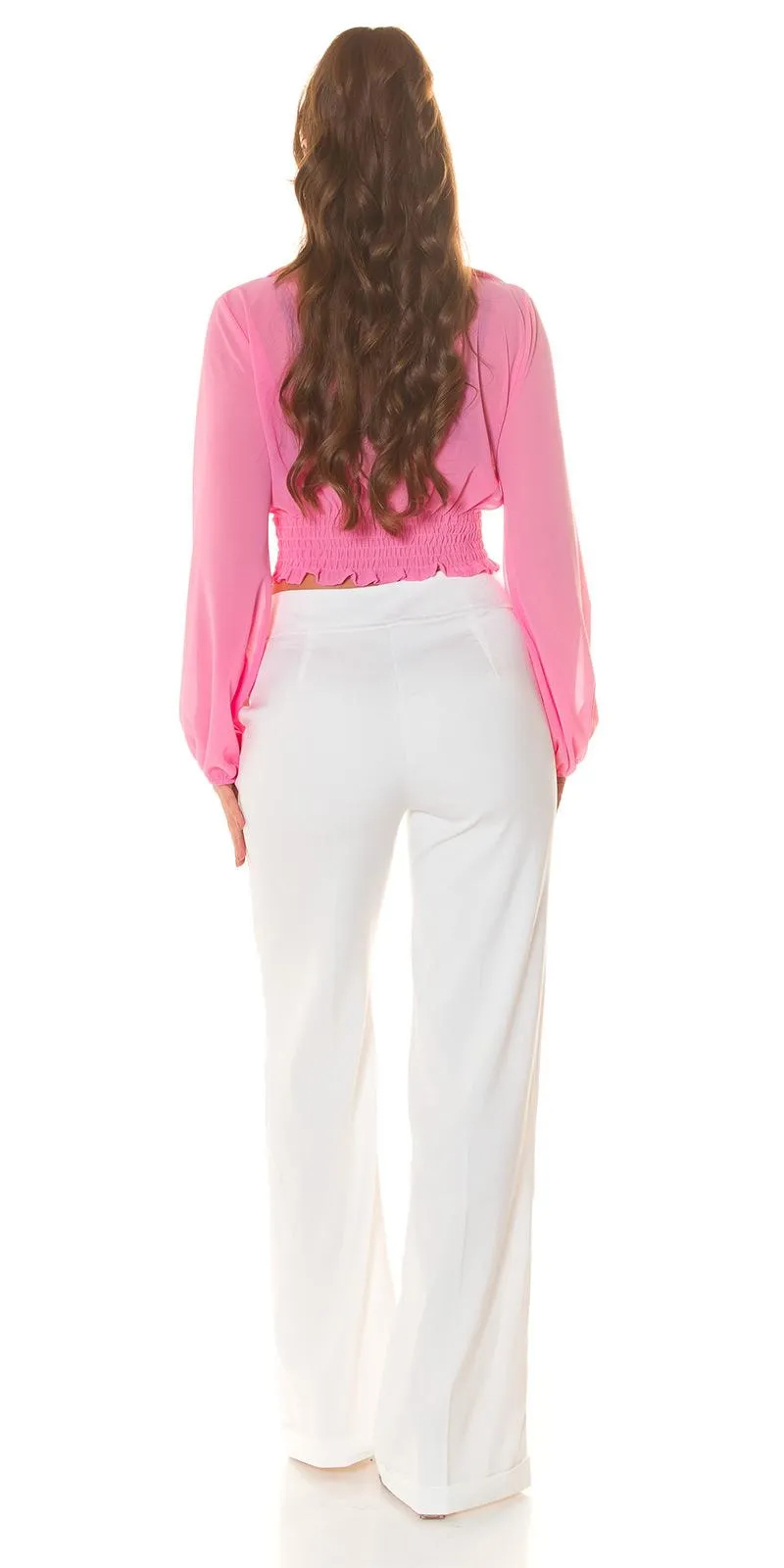Blusa rosa con manga larga amplias