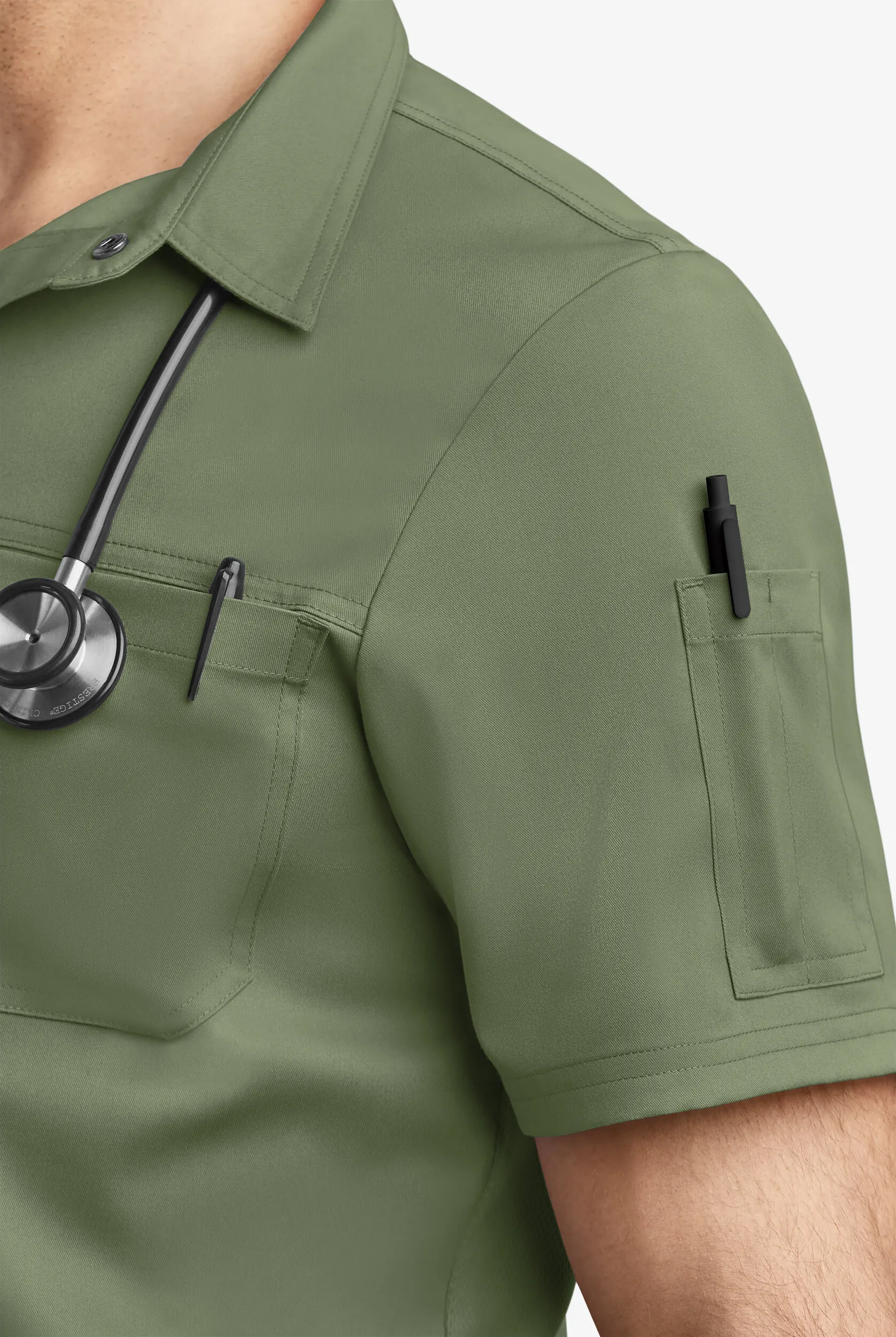 Camiseta médica estilo poloUA Advantage STRETCH con paneles de malla y 2 bolsillos para hombre