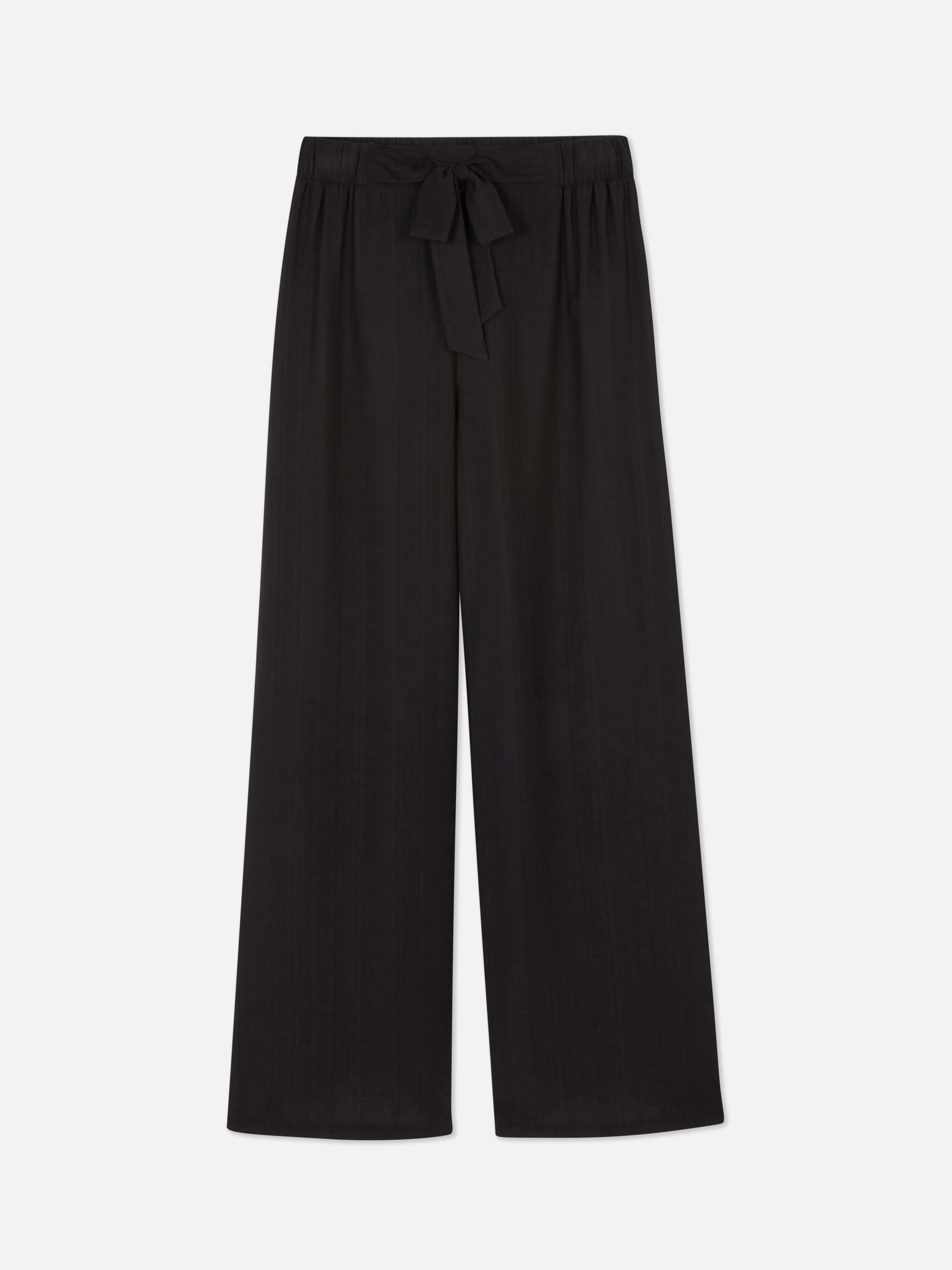 Pantalón palazzo con nudo delantero