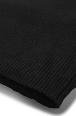 Vestido de punto para niños con logo tachonado