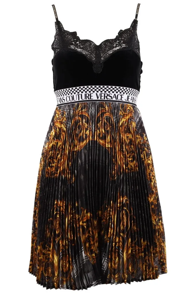 Vestido negro con estampado barroco dorado