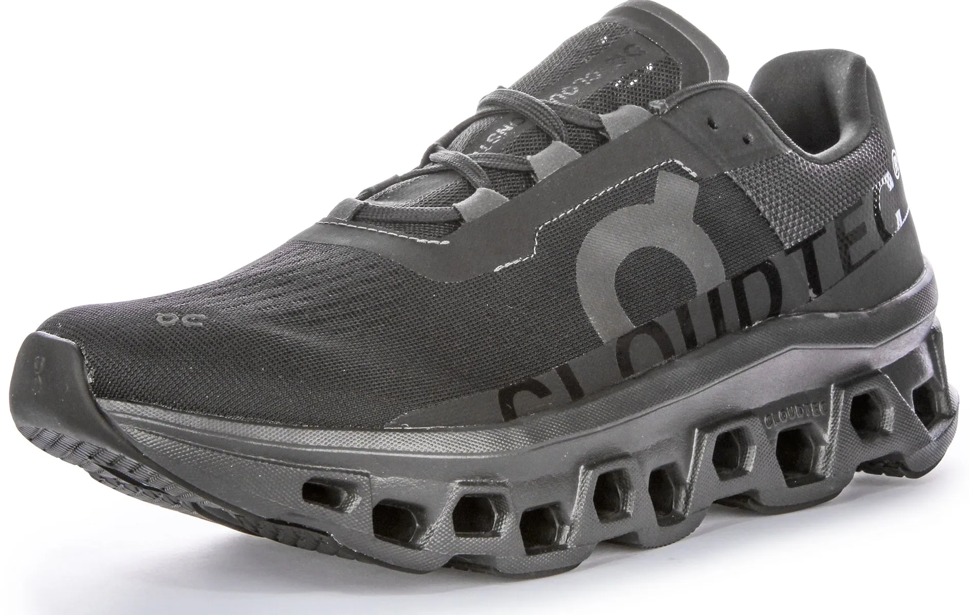 Zapatillas icónicas de Cloudtec Bounce de On Running Cloudmonster para hombres en blanco y negro